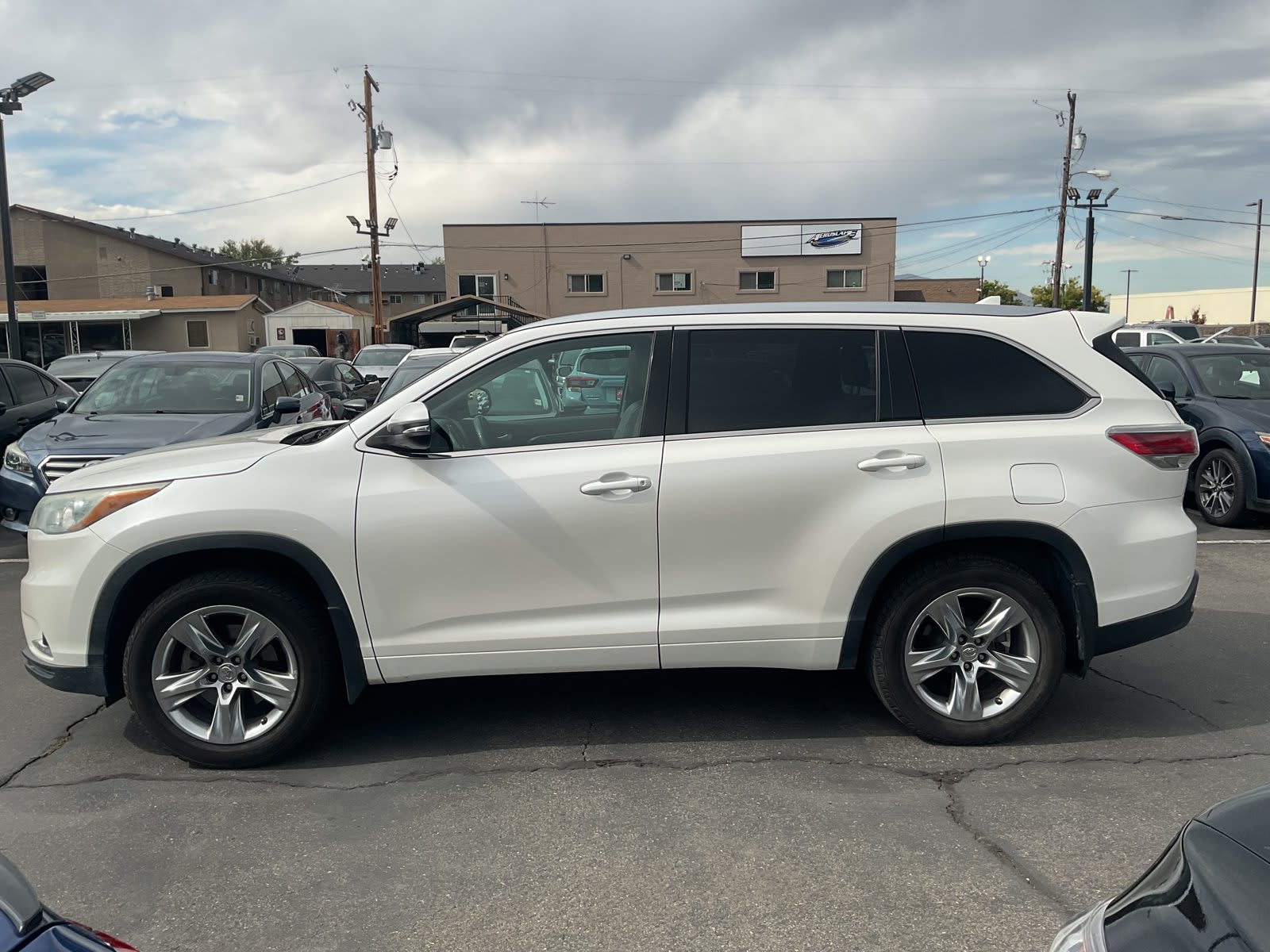 2014 Toyota Highlander used sport utility for sale at Peterson Auto Sales in Midvale, UT — photo 4 of 23