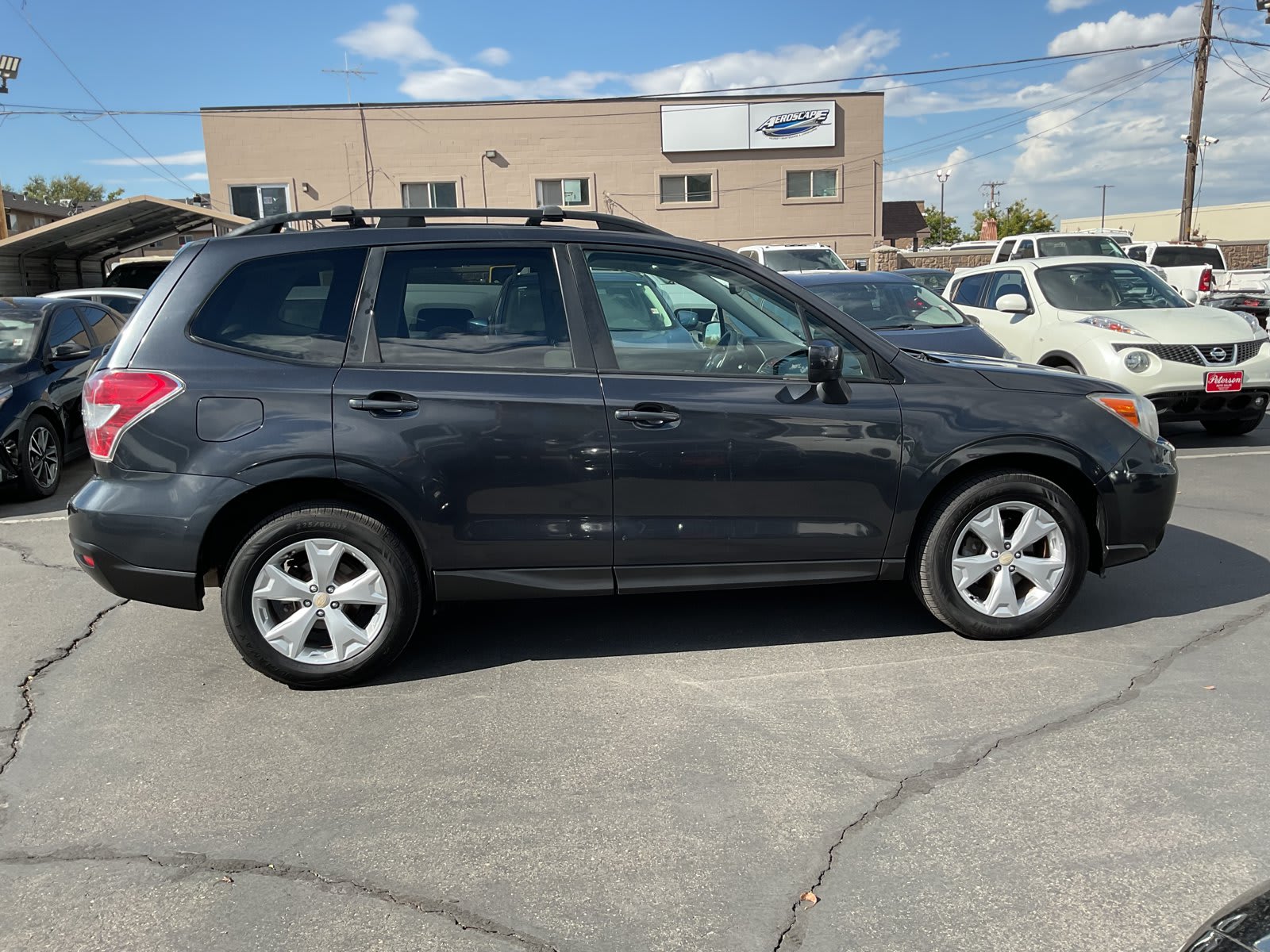 2015 Subaru Forester used sport utility for sale at Peterson Auto Sales in Midvale, UT — photo 5 of 21