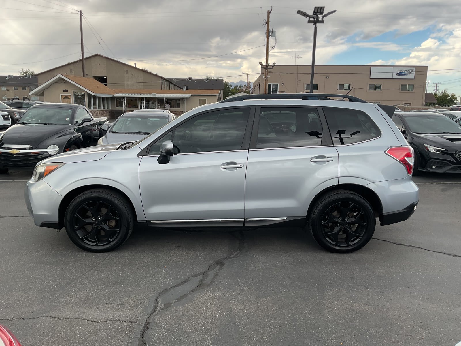 2015 Subaru Forester used sport utility for sale at Peterson Auto Sales in Midvale, UT — photo 5 of 22