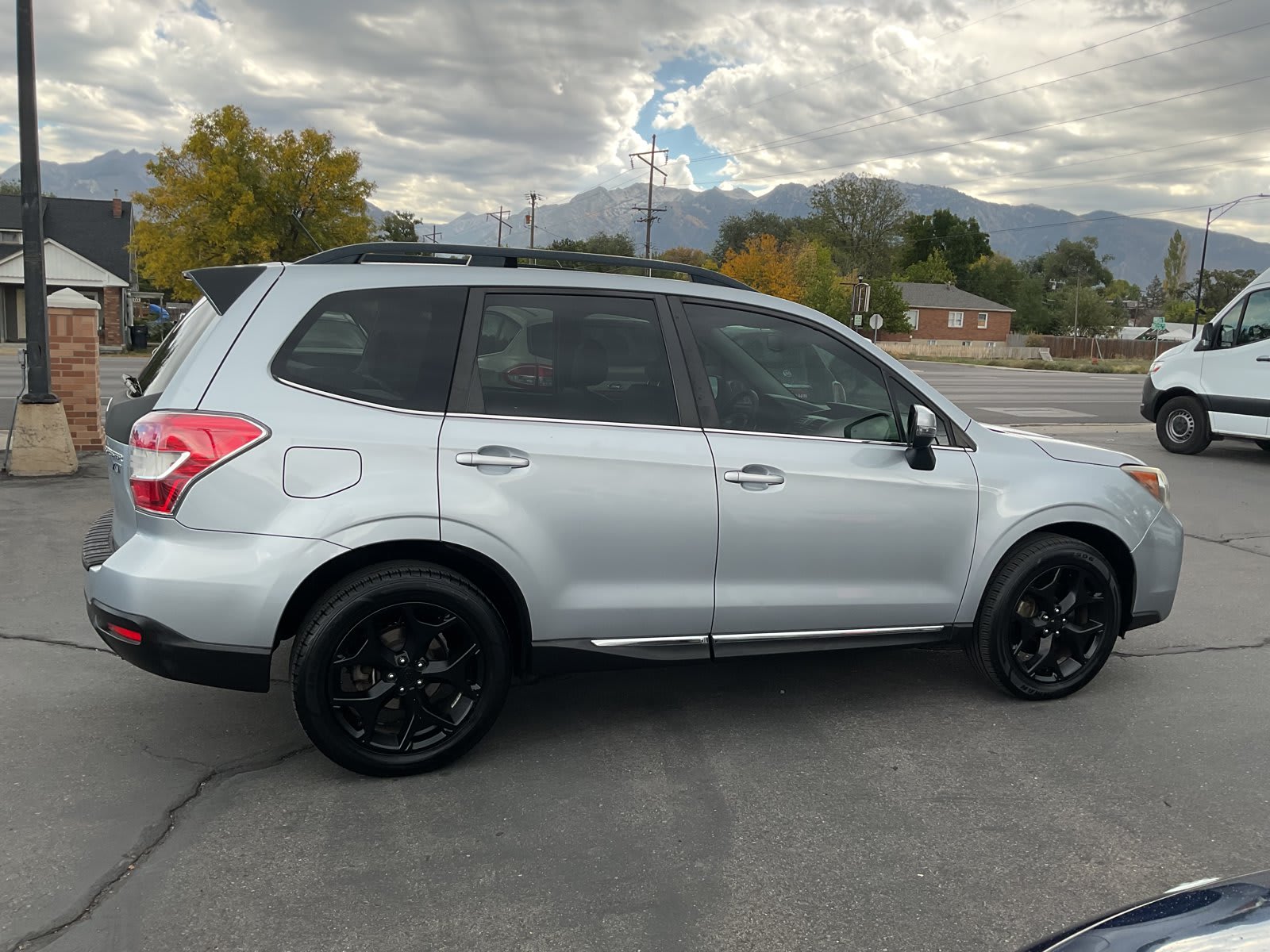 2015 Subaru Forester used sport utility for sale at Peterson Auto Sales in Midvale, UT — photo 4 of 22