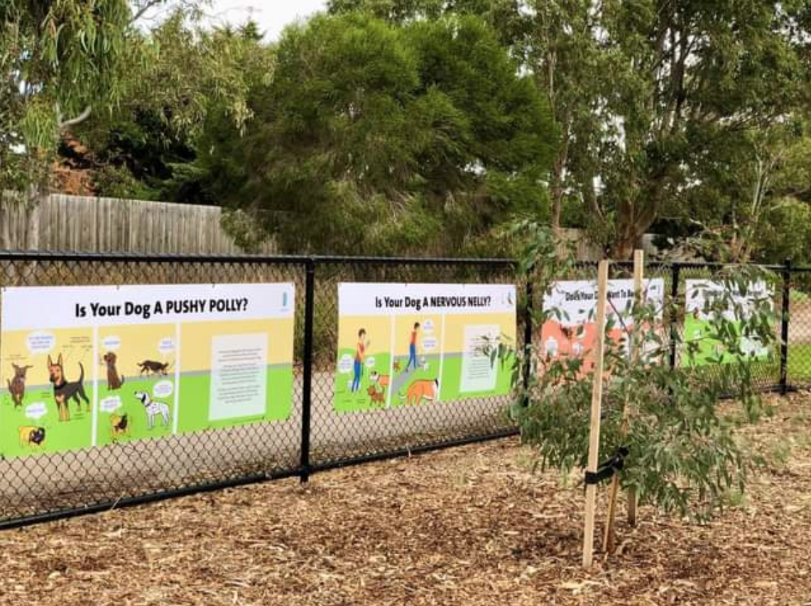 The dog park banners, which include eye-catching cartoons and slogans