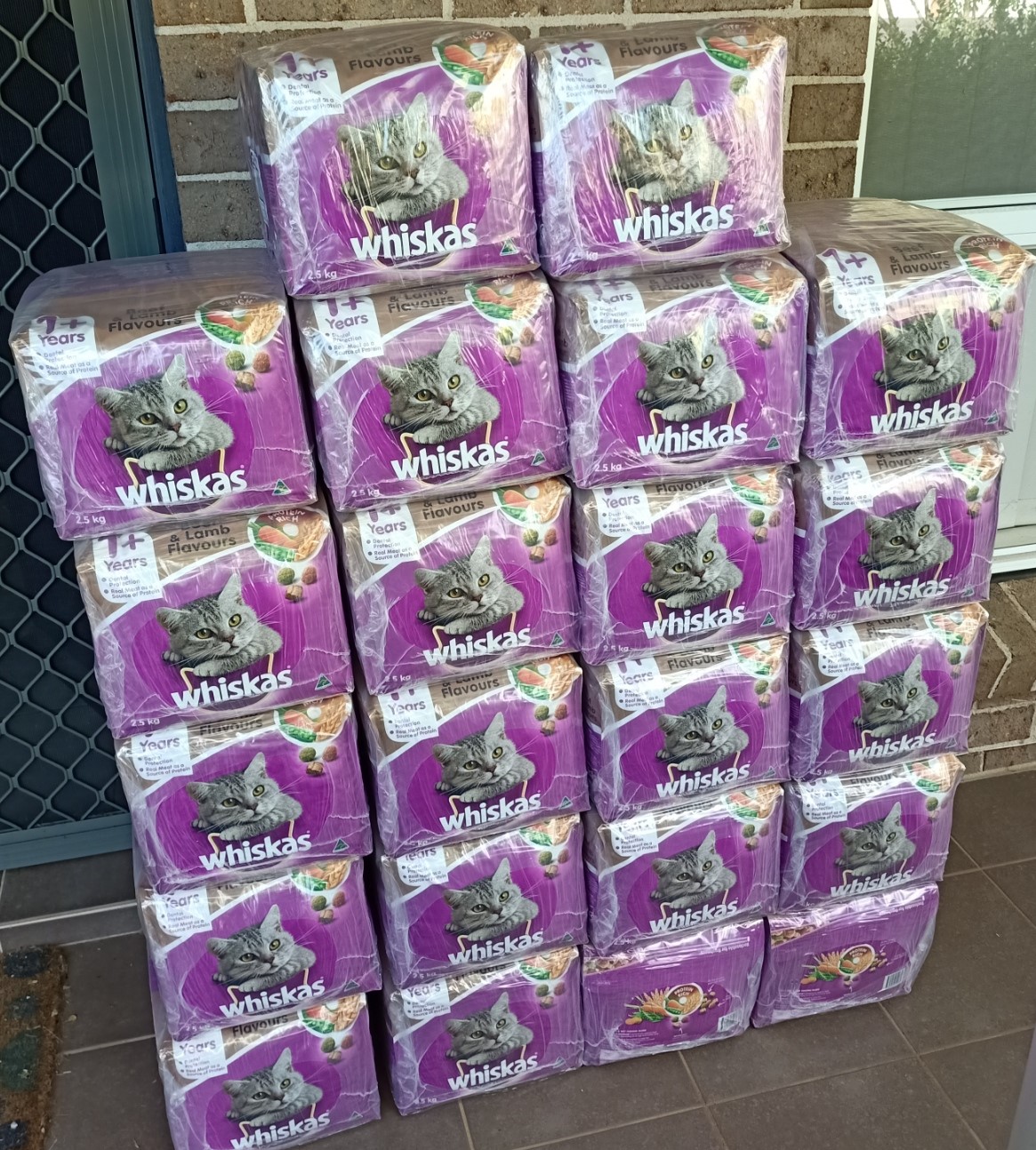 A huge pile of Whiskas food