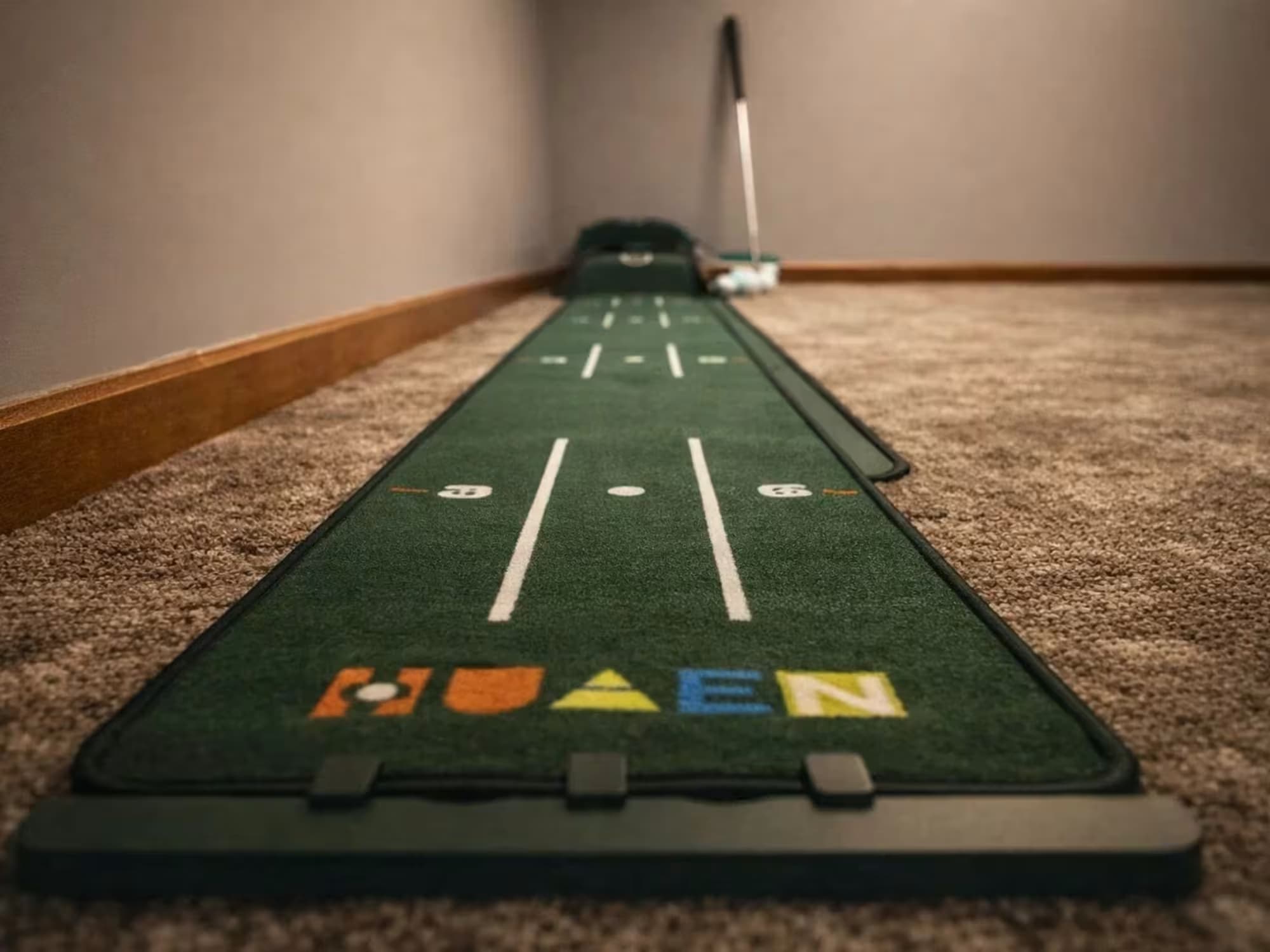 Michigan Vacation Home Rental Long Lake Retreat indoor putting