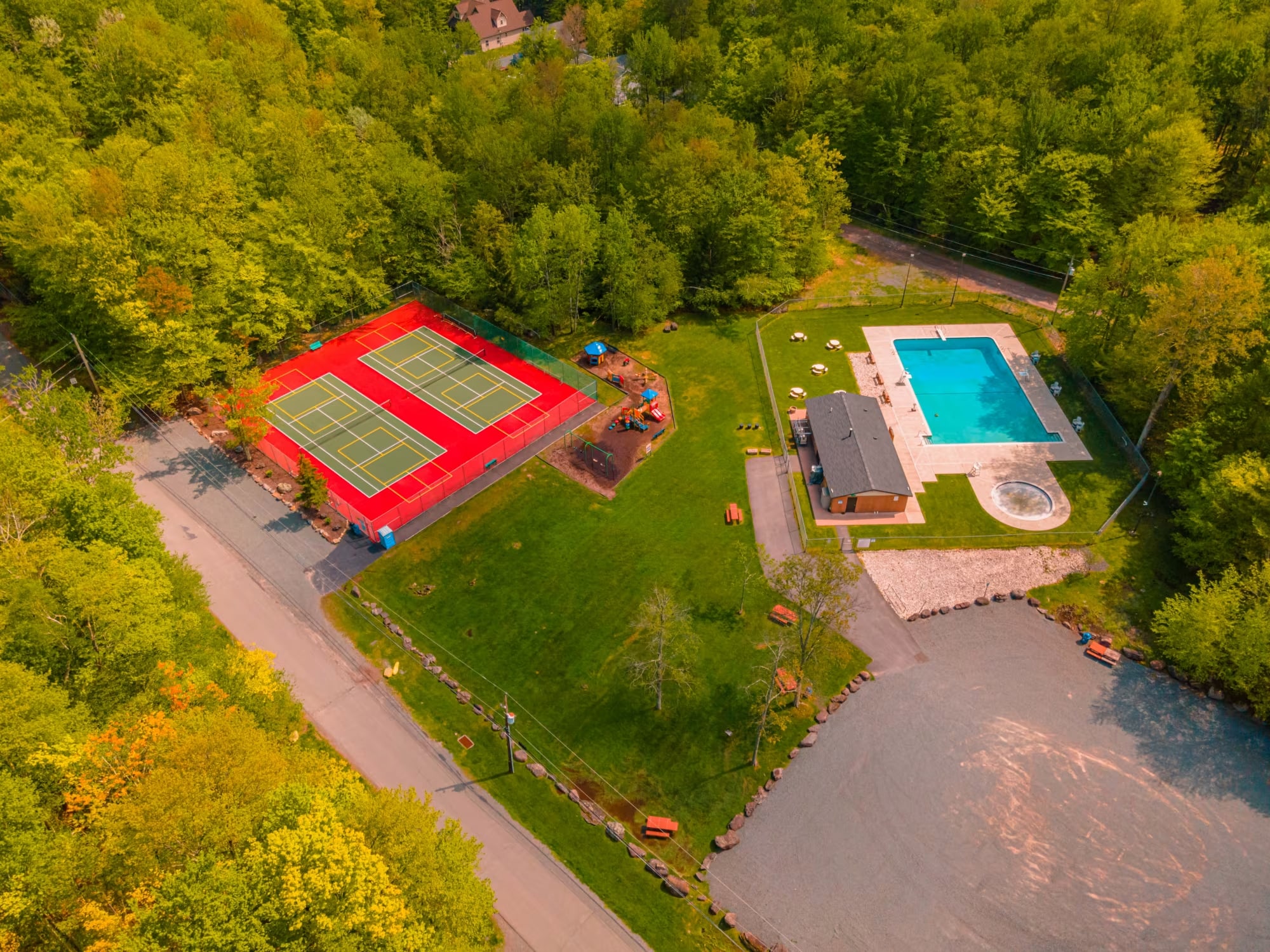 Pocono Lake Vacation Home Rental Pocono Lake Retreat Amenity tennis court and pool