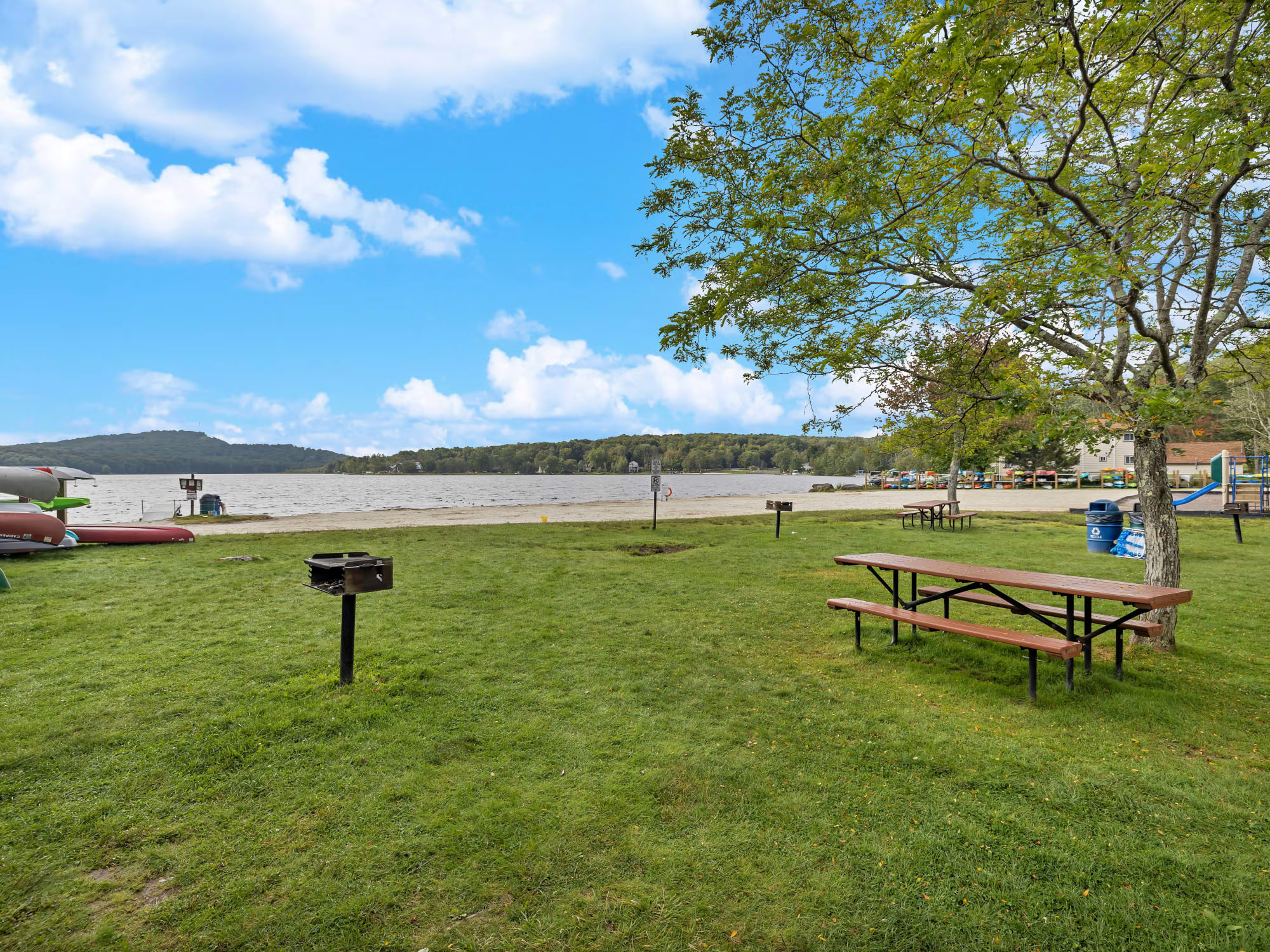 Pocono Lake Vacation Home Rental Pocono Lake Retreat outdoor seating with lake view