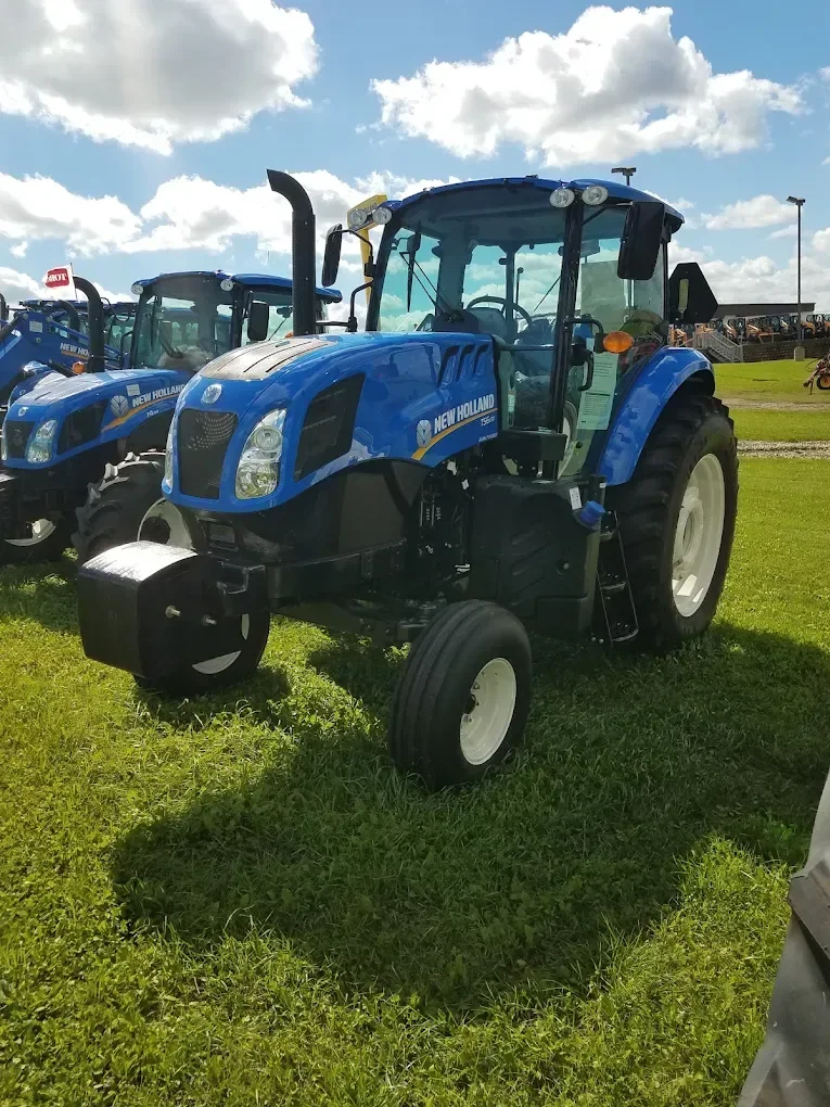 Blue New Holland tractor photographed at Carl F. Statz & Sons
