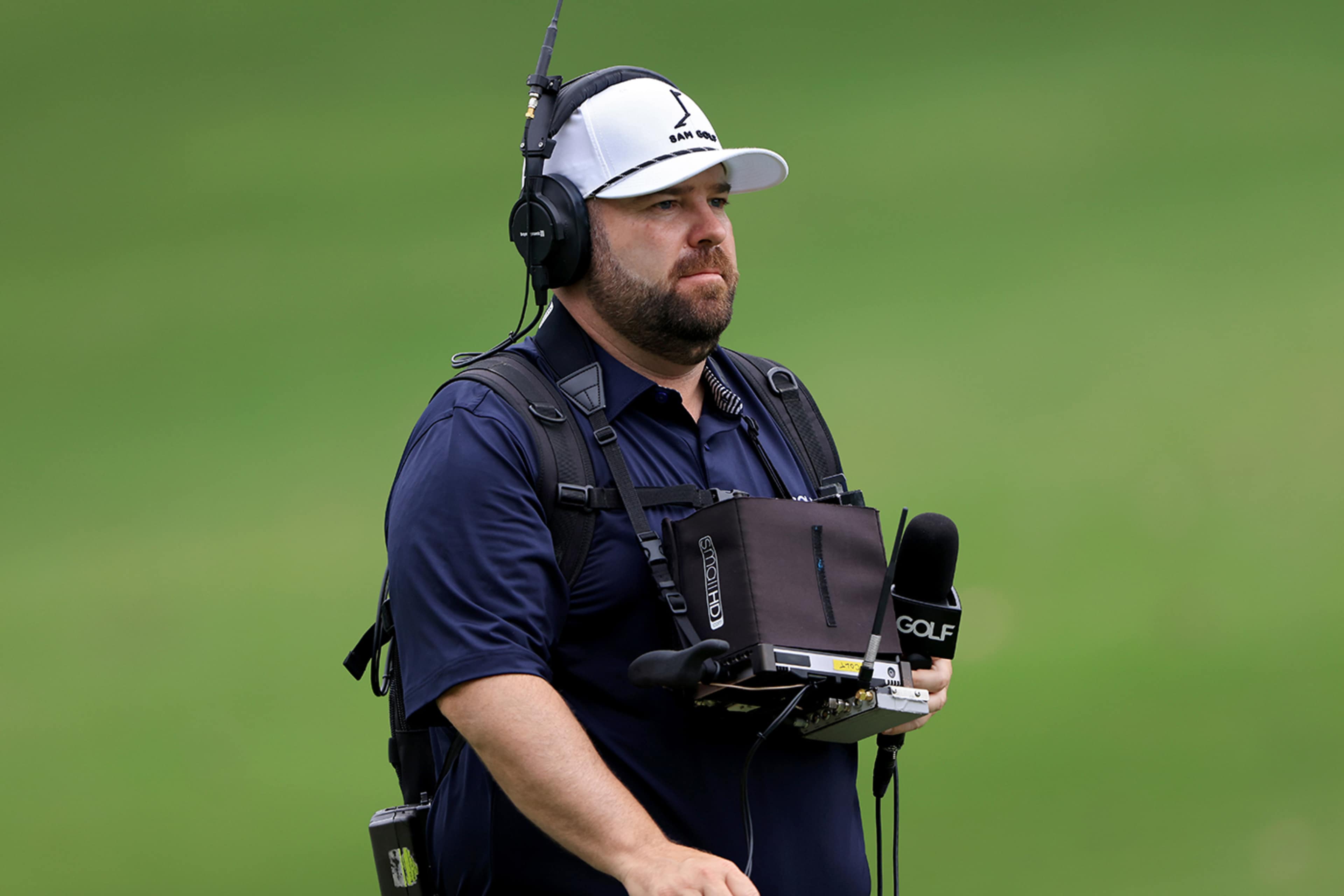 Knost trades microphone for caddie bib at WM Phoenix Open