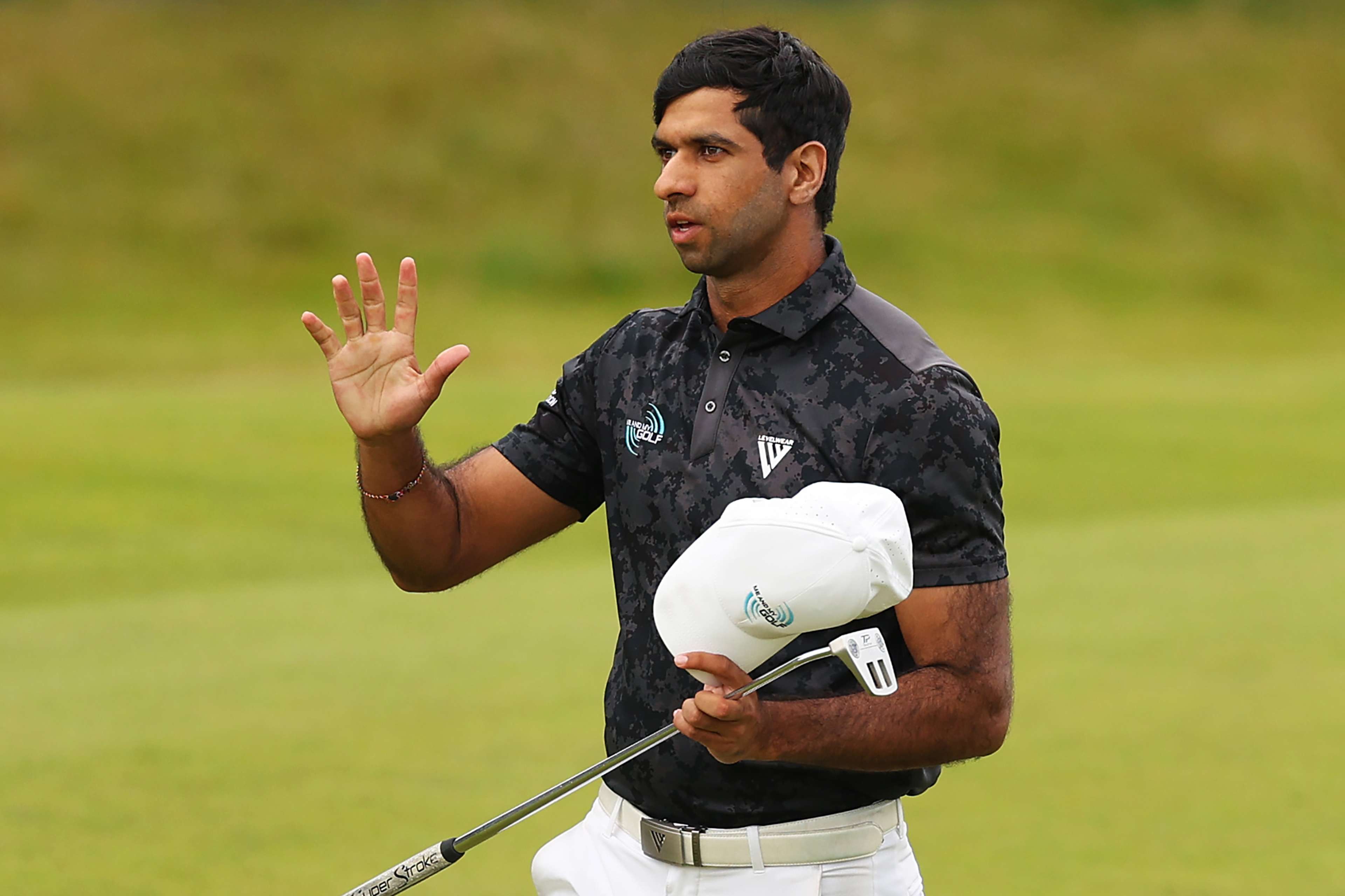 Rai plays way into The Open
