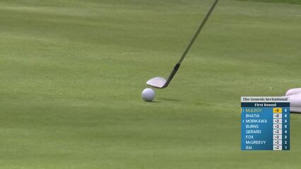 Rory McIlroy hits chip from on green, over bunker at The Genesis