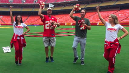 Kansas City Chiefs cheerleaders teach Brice Garnett and Dan Woltman a dance