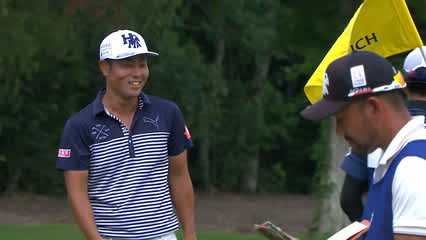 Hideto Tanihara rolls in slick, downhill putt at Zurich