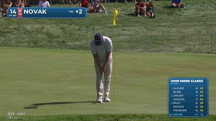 Andrew Novak sinks 9-foot putt for birdie on No. 14 at John Deere