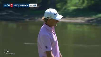Austin Smotherman rolls in a 12-foot for birdie at John Deere