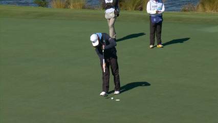 James Hahn taps in birdie putt after near eagle make at The RSM Classic