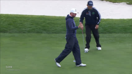 Robert Garrigus holes a 30-foot birdie putt at AT&T Pebble Beach