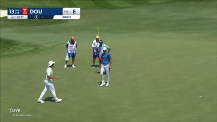 Zecheng Dou holes a 23-foot birdie putt at 3M Open