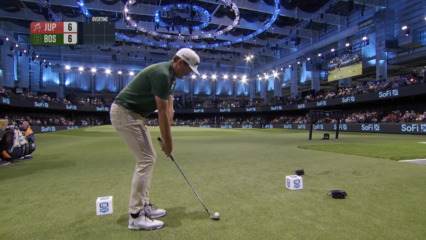 Keegan Bradley hits the pin in OT