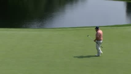 Kevin Stadler holes a lengthy putt to save par at Bridgestone