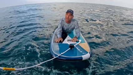 Dicky Pride learns how to surf