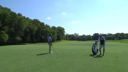 Chandler Blanchet taps in for birdie at Compliance Solutions