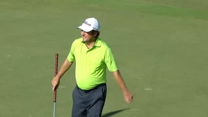 Tim Clark sinks his uphill 18-foot putt for birdie at Hyundai