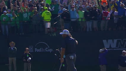 Chad Collins drops in a 15-footer at Waste Management