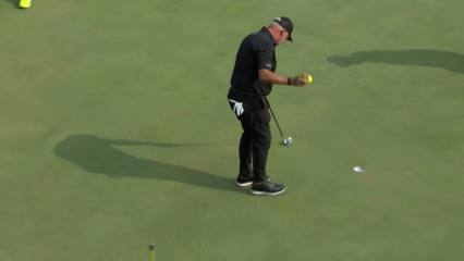 Darren Clarke brushes in a birdie putt at Ascension