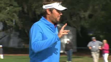 Jeff Overton drops in a 22-foot putt for birdie at The RSM Classic