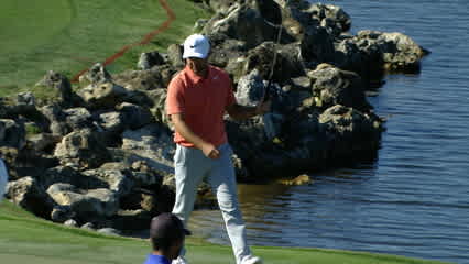 Trevor Immelman raises his putter on the way to eagle at Arnold Palmer