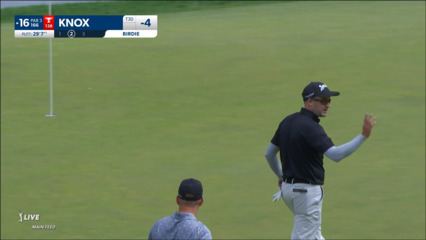 Russell Knox walks in a 29-foot birdie putt at Travelers
