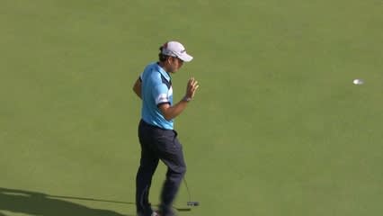 Edoardo Molinari rolls in a 17-foot birdie putt at The Open