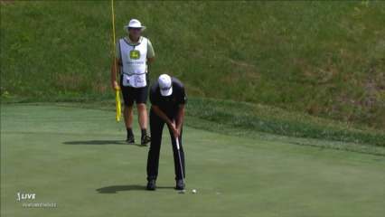 Jim Herman taps in putt for birdie at John Deere