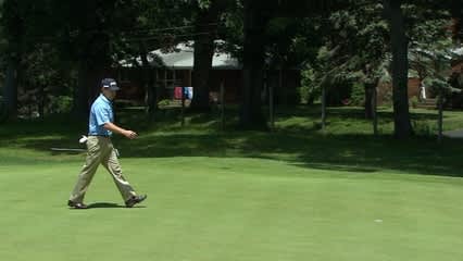 Jeff Maggert drains a 26-foot putt for birdie at Travelers
