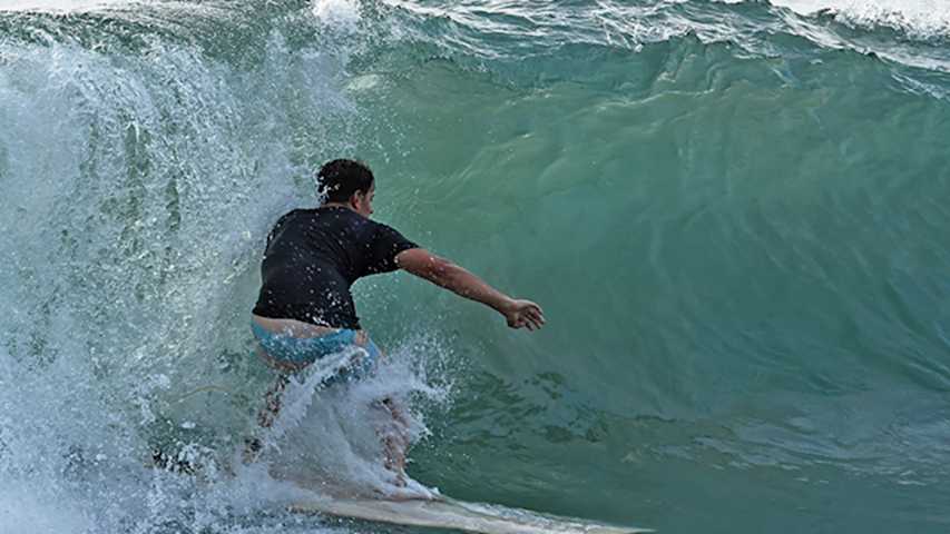 Brad Gehl goes surfing before the Flor de Caña Open