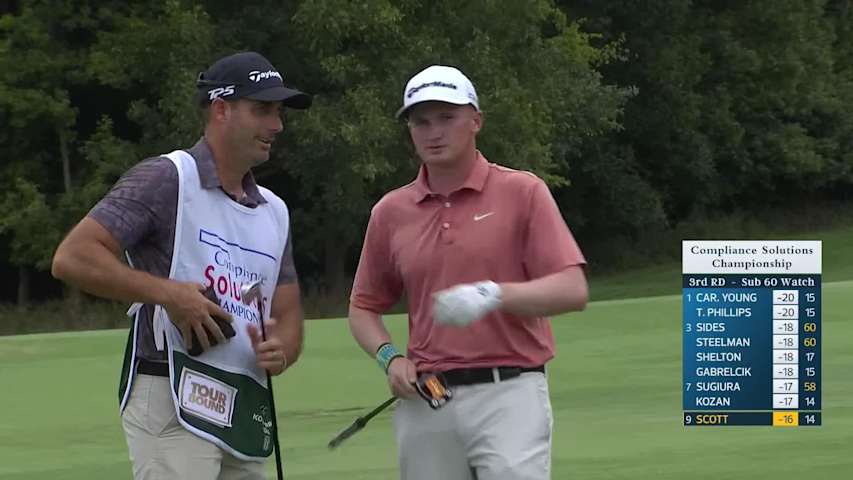 Sandy Scott sinks a eagle putt on No. 15 at Compliance Solutions