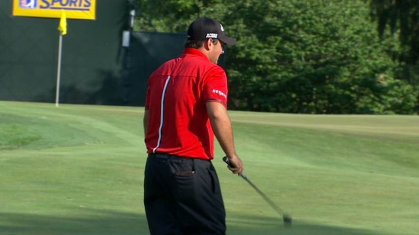 Patrick Reed's approach at No. 16 rolls to 2 feet at Quicken Loans