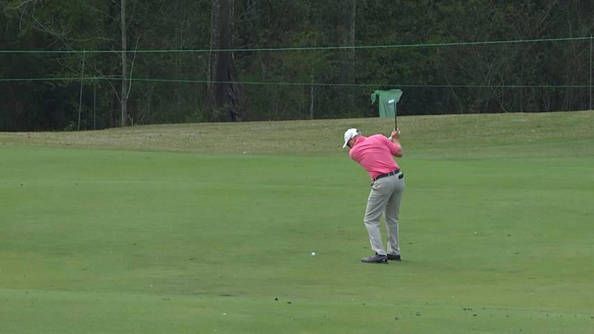 Kevin Johnson's approach shot hit flagstick at Rapiscan Classic