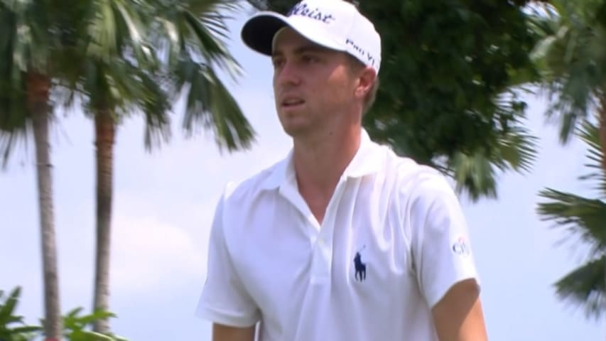 Justin Thomas attacks the pin on No. 15 at CIMB