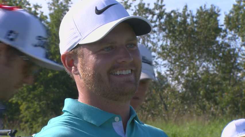 Tom Lewis hits the flagstick on No. 16 at Korn Ferry Tour Championship