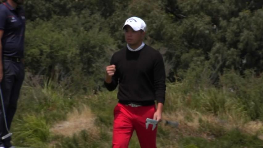 Chan Shih-chang slides in a par saver at ISPS HANDA