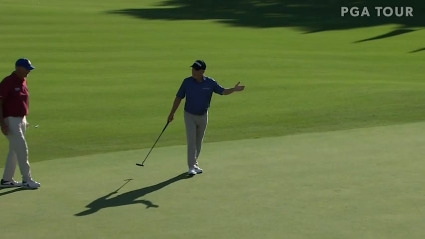 Jeff Sluman drops a long birdie putt on the 18th at Dominion Energy