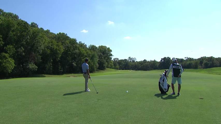 Chandler Blanchet taps in for birdie at Compliance Solutions
