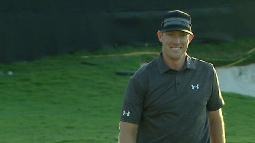 Hunter Mahan finishes with a 55-foot birdie putt at Cadillac