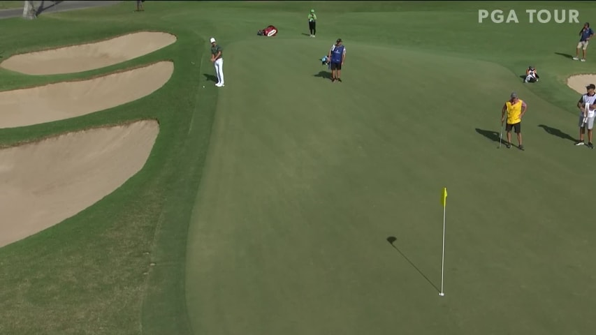 Joaquin Niemann chips in for birdie at the Sony Open