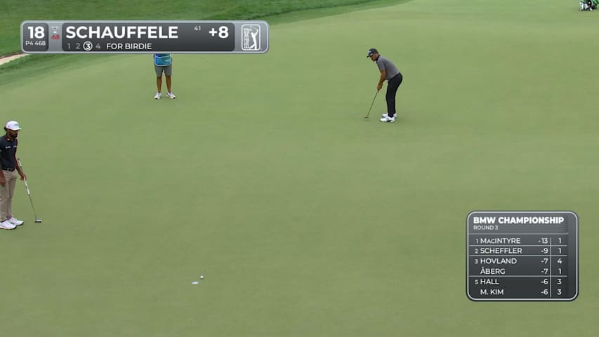 Xander Schauffele sinks a 34-foot birdie putt on No. 18 at BMW Championship