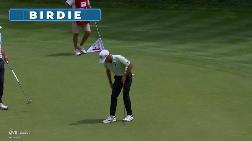 Eric Cole drains 8-foot putt for birdie on No. 14 at Travelers