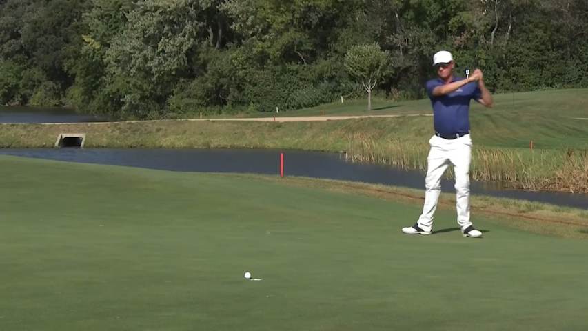 Michael Wright bends in birdie putt at Sanford International