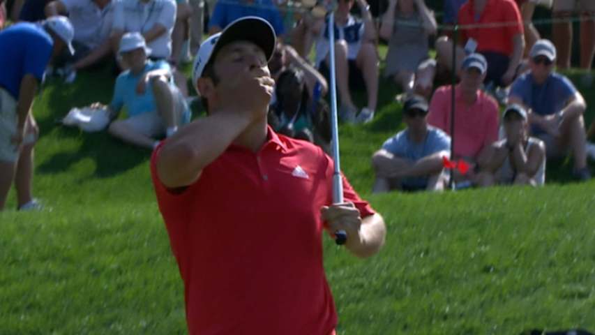 Jon Rahm reacts to an unbelievable lip out at Quicken Loans