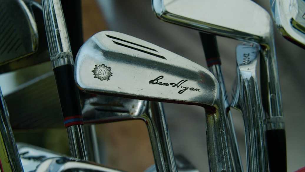 Players hit Ben Hogan's golf clubs on the range at Colonial