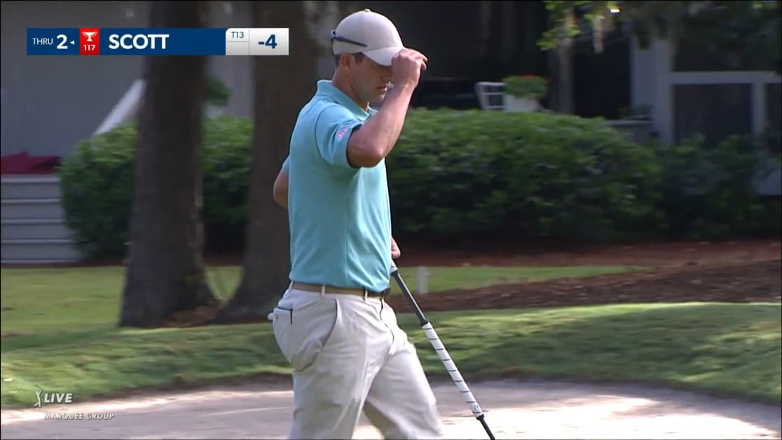 Adam Scott rolls in a 22-foot birdie putt on No. 11 at RBC Heritage